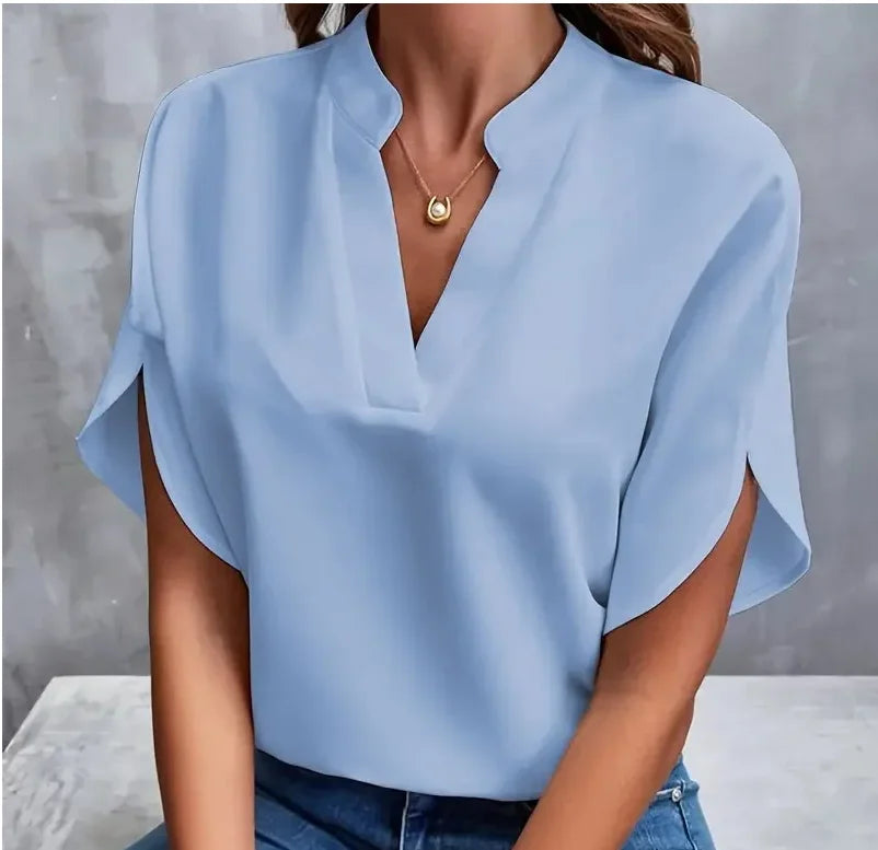Elegant women's summer blouse with a V-neck.