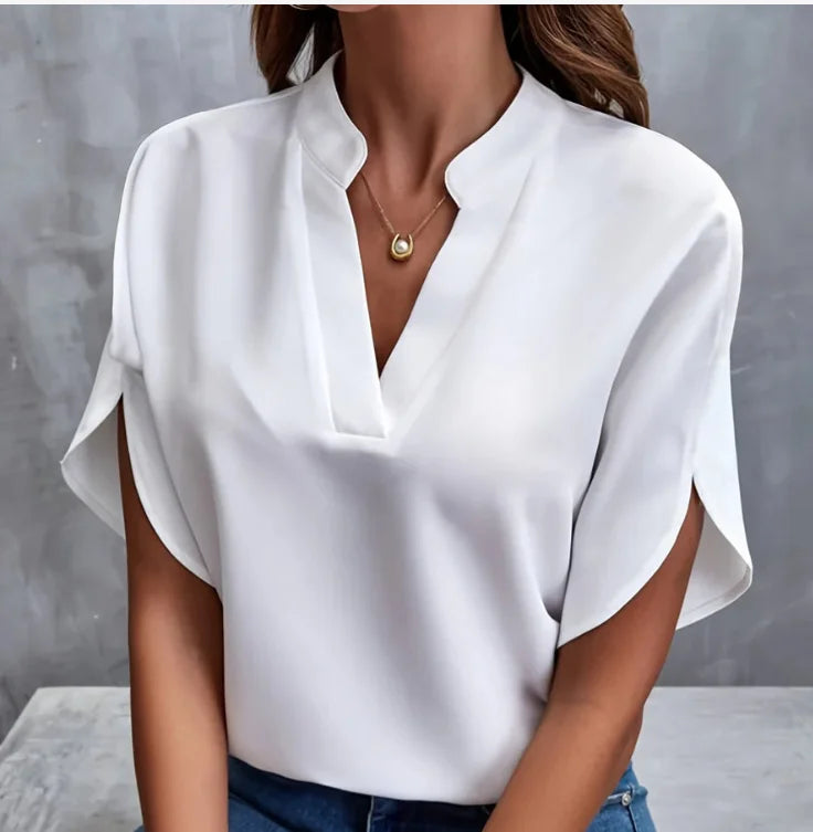 Elegant women's summer blouse with a V-neck.
